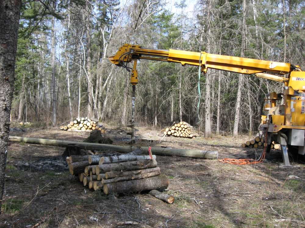Naturist Legacy History: Gallery 08/04...Hydro installs power line poles