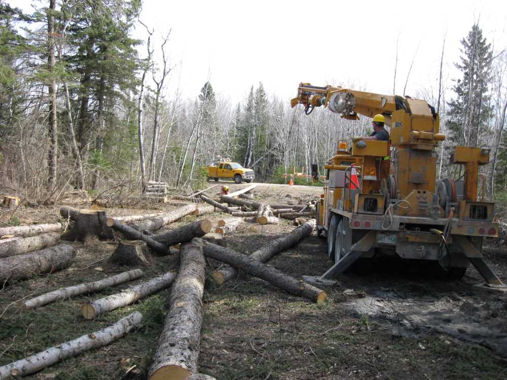 Naturist Legacy History: Gallery 08/15...Hydro installs power line poles