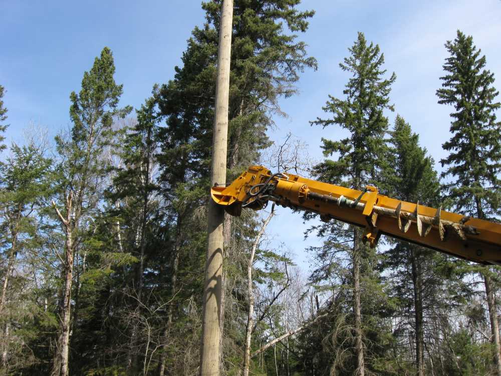 Naturist Legacy History: Gallery 08/22...Hydro installs power line poles