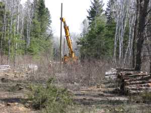 Naturist Legacy History: Gallery 08/26...Hydro installs power line poles