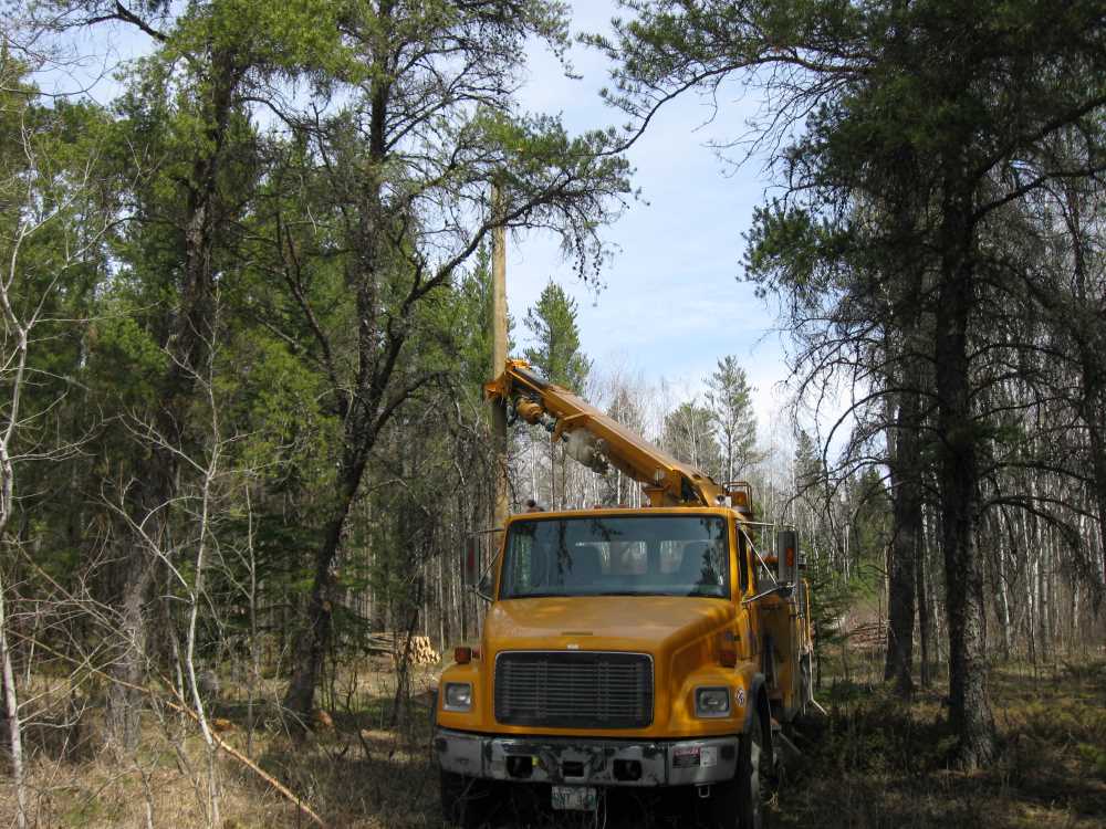 Naturist Legacy History: Gallery 08/38...Hydro installs power line poles