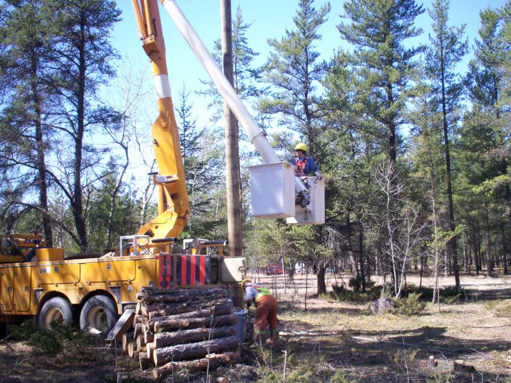 Naturist Legacy History: Gallery 09/12...Hydro installs wires and a transformer