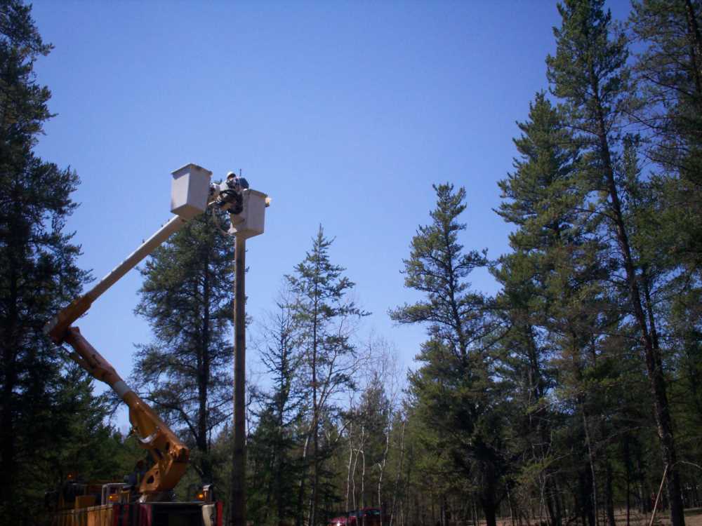 Naturist Legacy History: Gallery 09/15...Hydro installs wires and a transformer