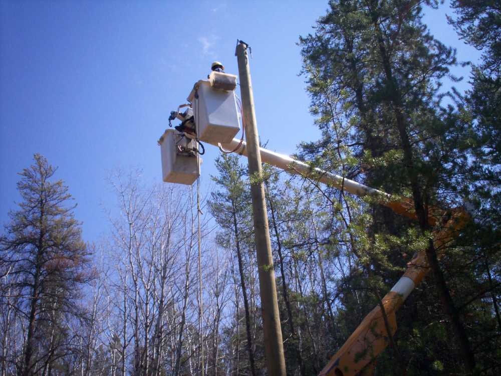 Naturist Legacy History: Gallery 09/17...Hydro installs wires and a transformer