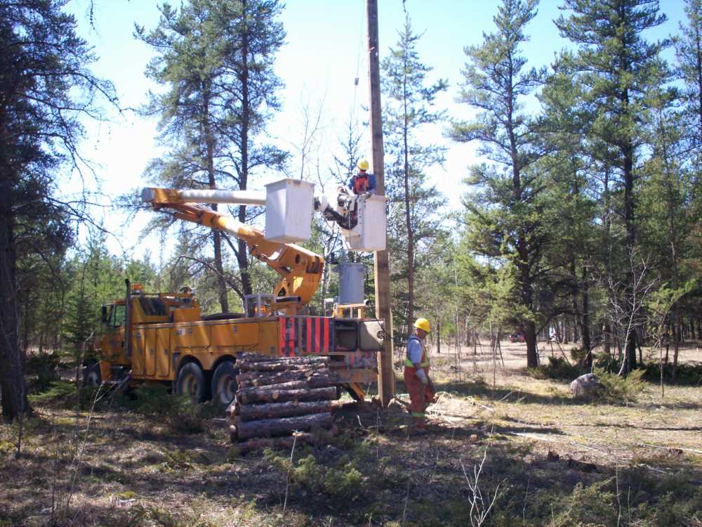 Naturist Legacy History: Gallery 09/21...Hydro installs wires and a transformer