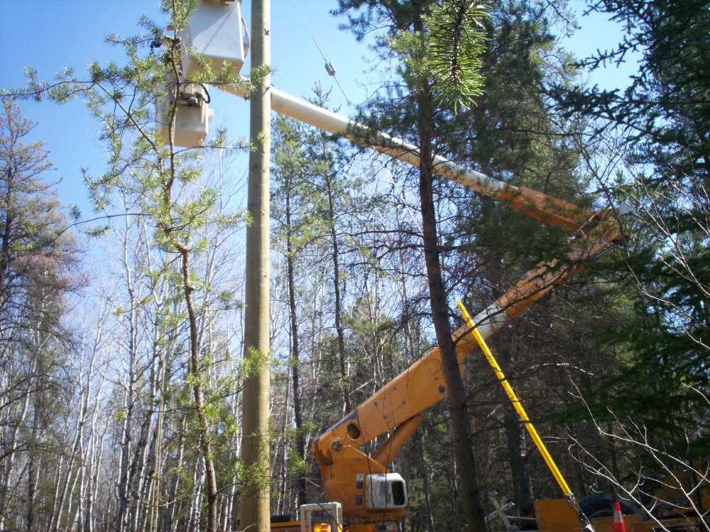 Naturist Legacy History: Gallery 09/22...Hydro installs wires and a transformer