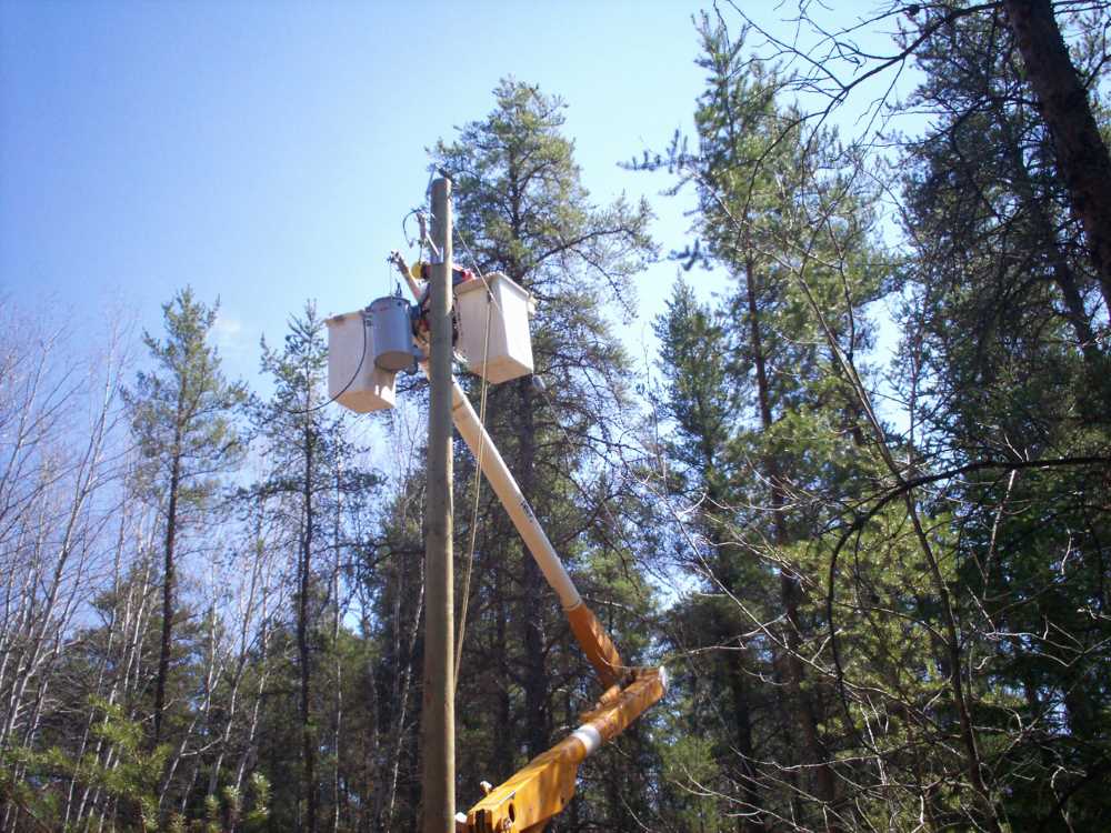 Naturist Legacy History: Gallery 09/25...Hydro installs wires and a transformer
