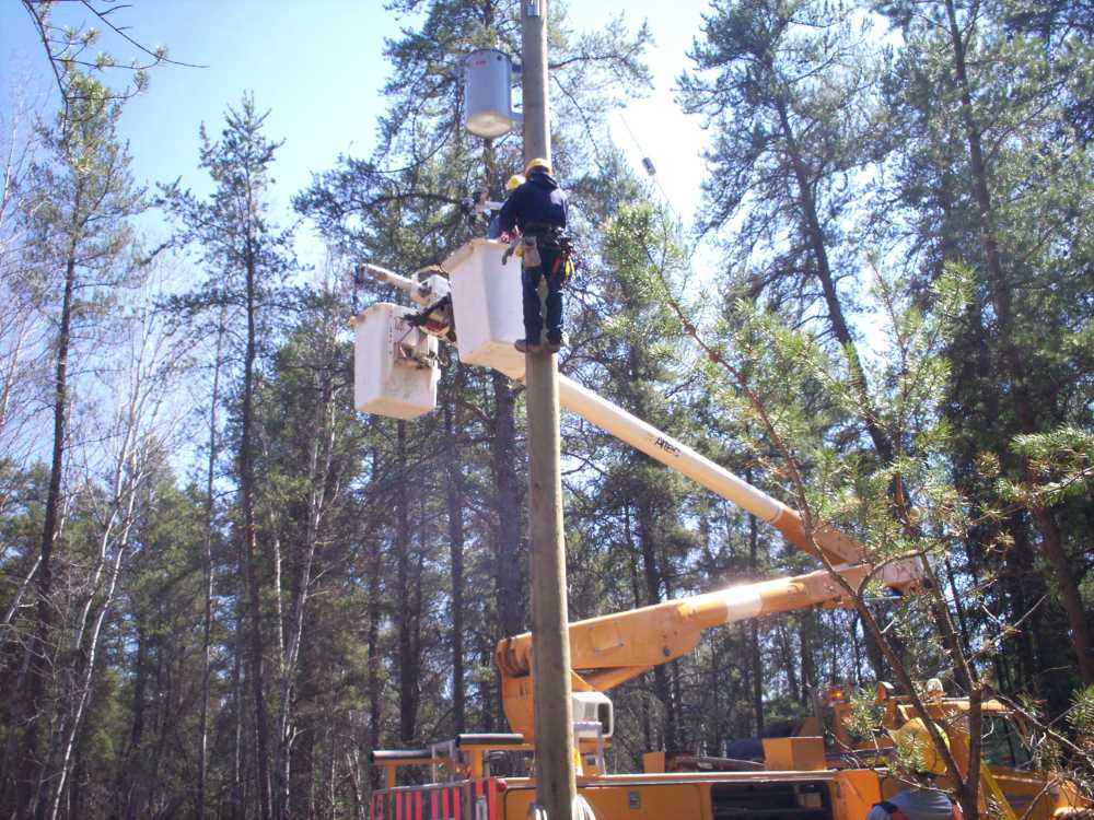 Naturist Legacy History: Gallery 09/27...Hydro installs wires and a transformer
