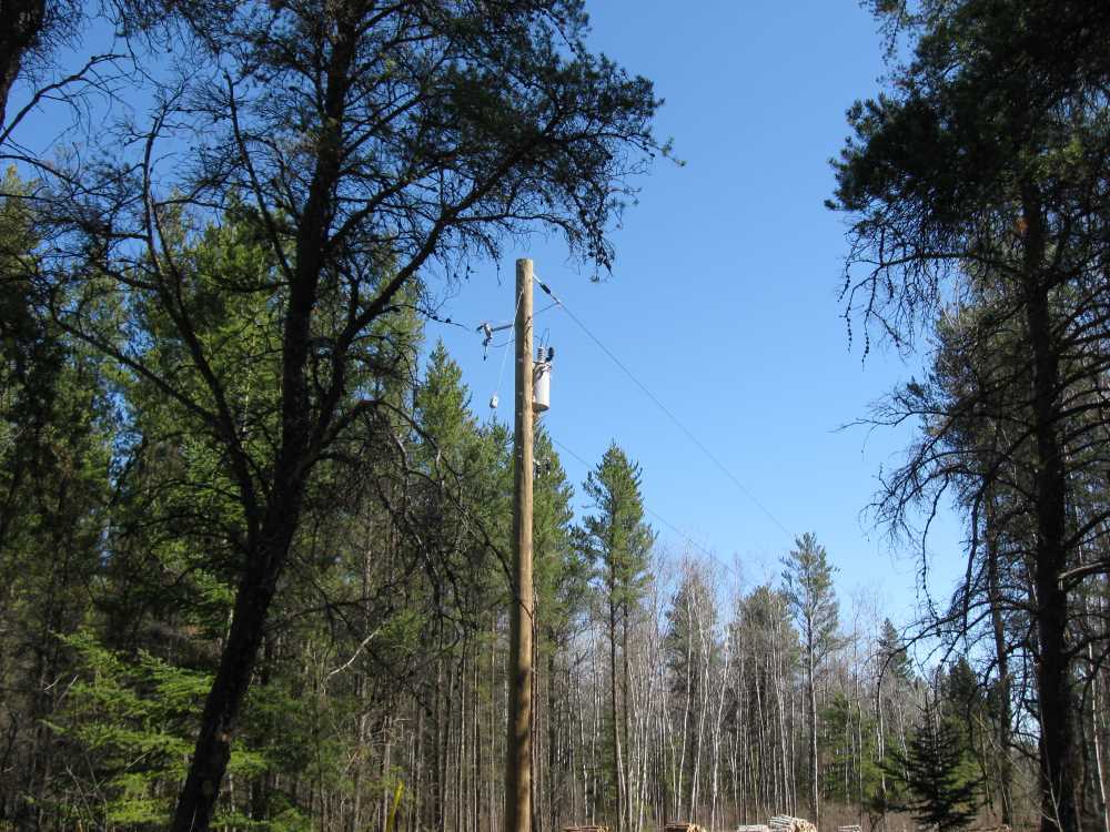 Naturist Legacy History: Gallery 09/29...Hydro installs wires and a transformer