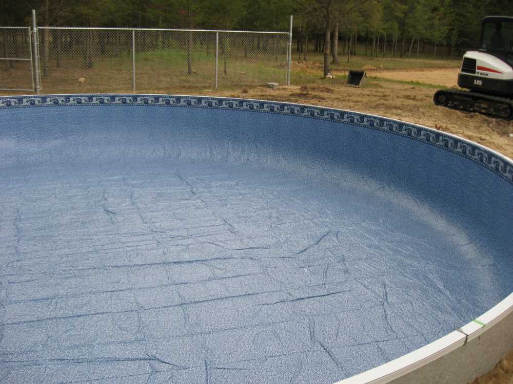 Naturist Legacy History: Gallery 27/14...Work continues on the swimming pool