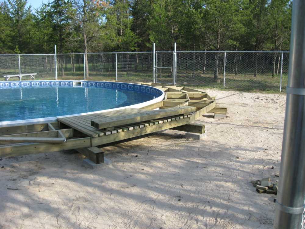 Naturist Legacy History: Gallery 28/01...Building a splash deck for the pool