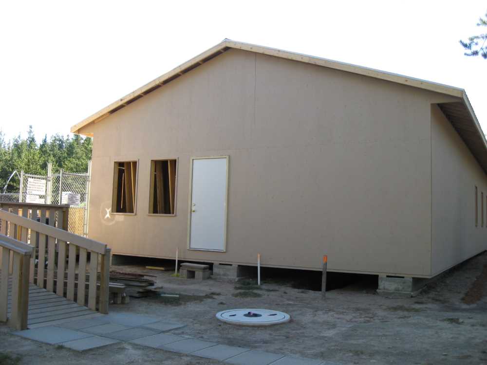 Naturist Legacy History: Gallery 44/01...Doors, windows, soffit installed