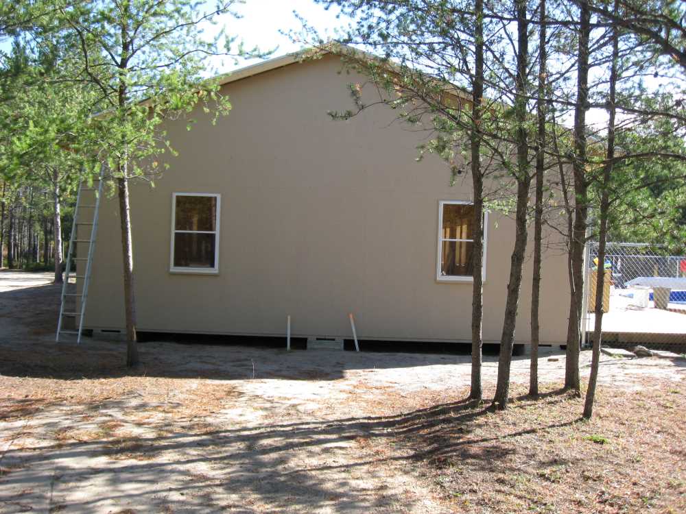 Naturist Legacy History: Gallery 44/07...Doors, windows, soffit installed