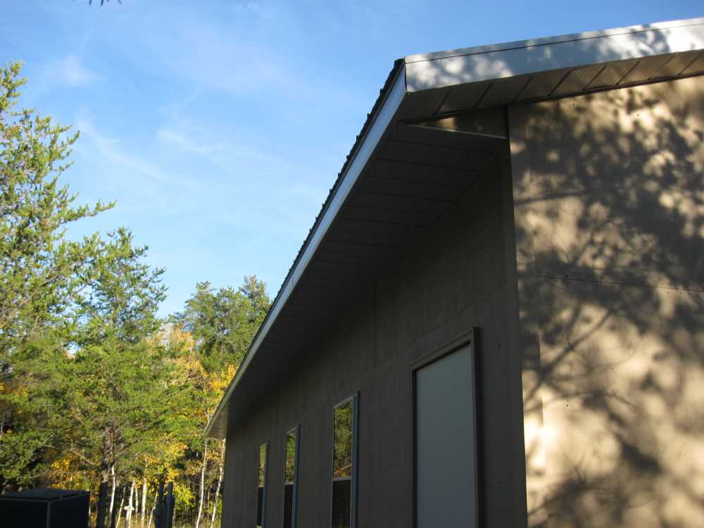 Naturist Legacy History: Gallery 44/14...Doors, windows, soffit installed